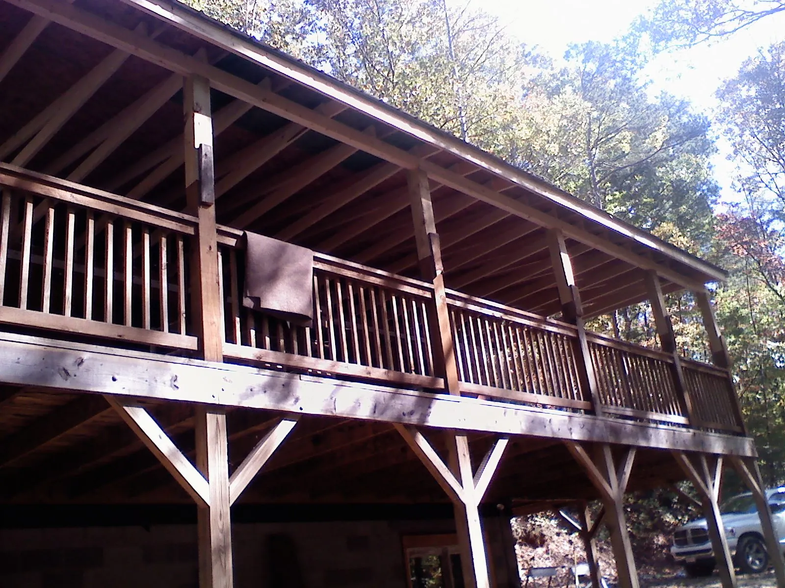 Timber framing under a new elevated porch and deck — Roof Leak Repair in Madisonville by Roofing Brothers